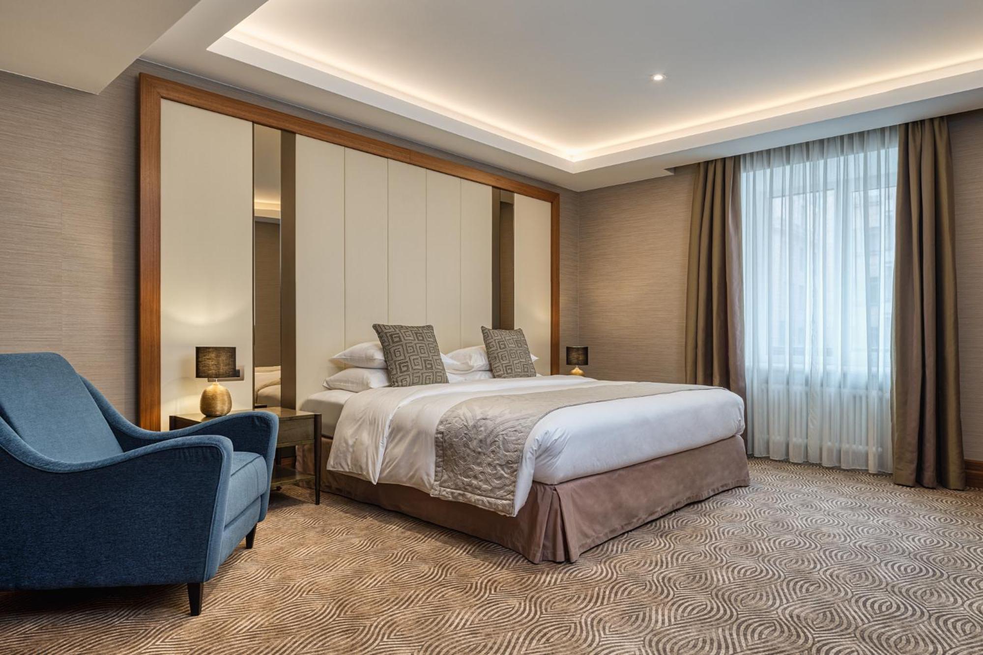 Grand Hotel Kempinski Riga Exterior foto A bedroom at the hotel