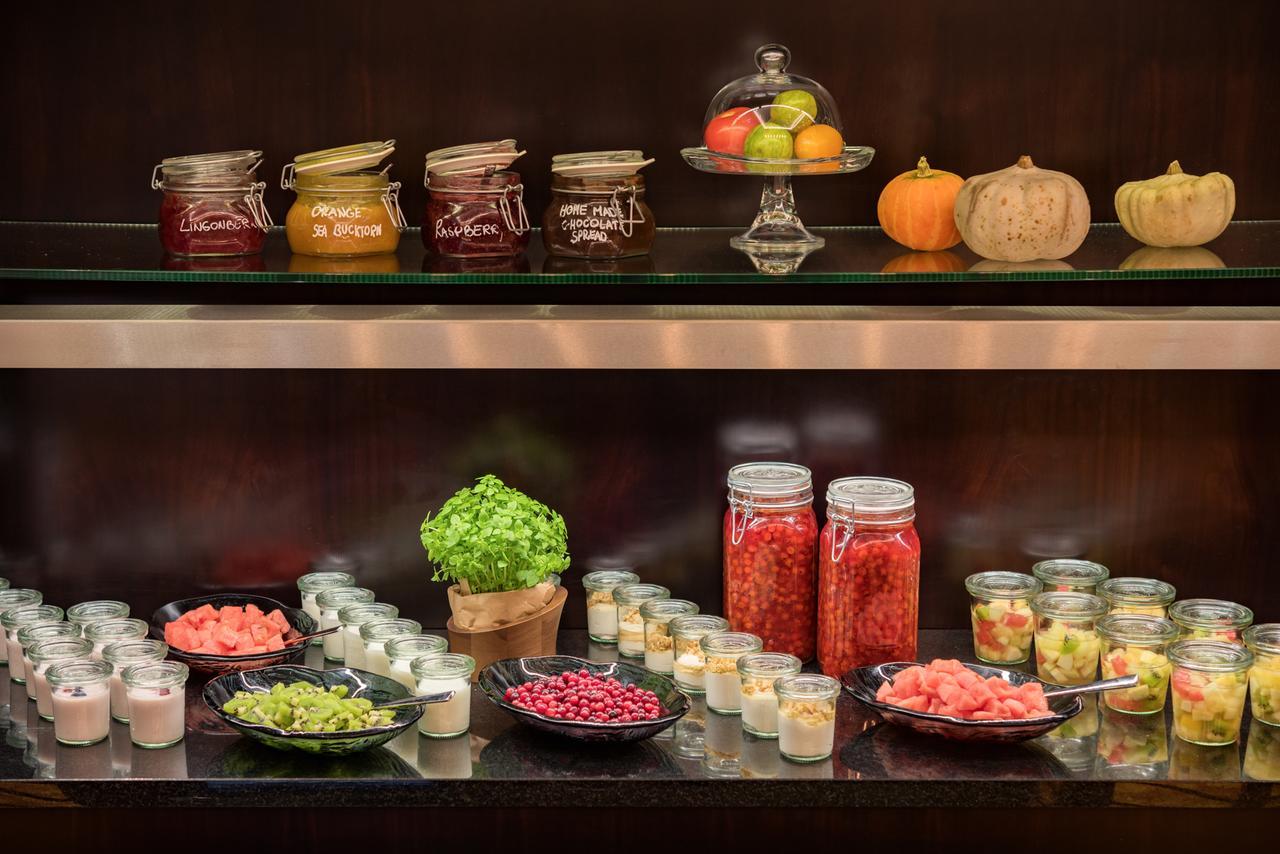 Grand Hotel Kempinski Riga Exterior foto A selection of jams and fruit preserves